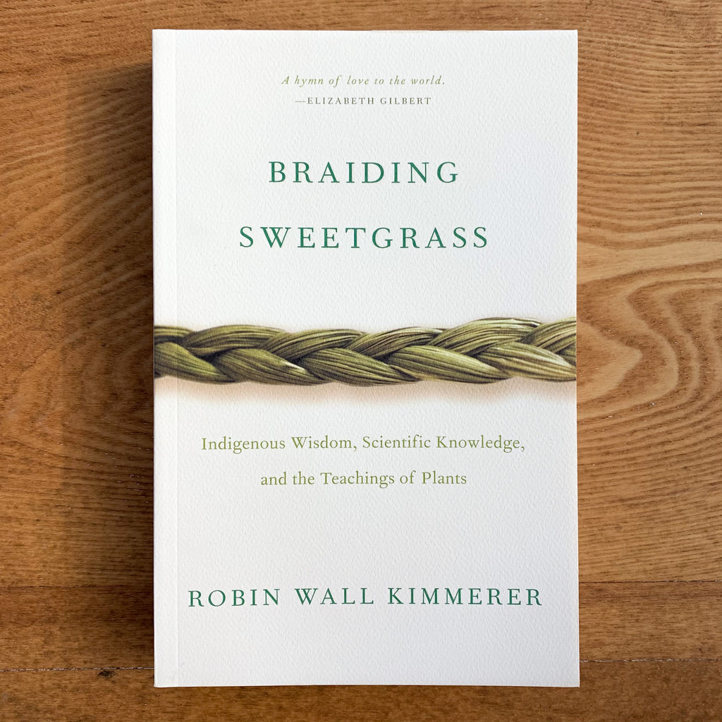 Softcover book cover, cream-colored with a single horizontal image of a sweetgrass braid bisecting it
