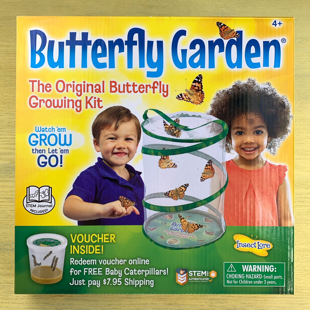 Box front with photo of two kids releasing butterflies from a pop-up enclosure