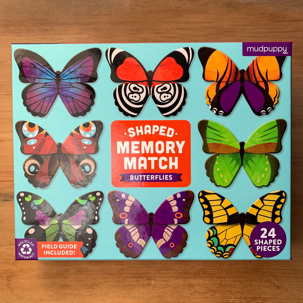 Game box cover with blue background and 8 different colorful butterfly designs 