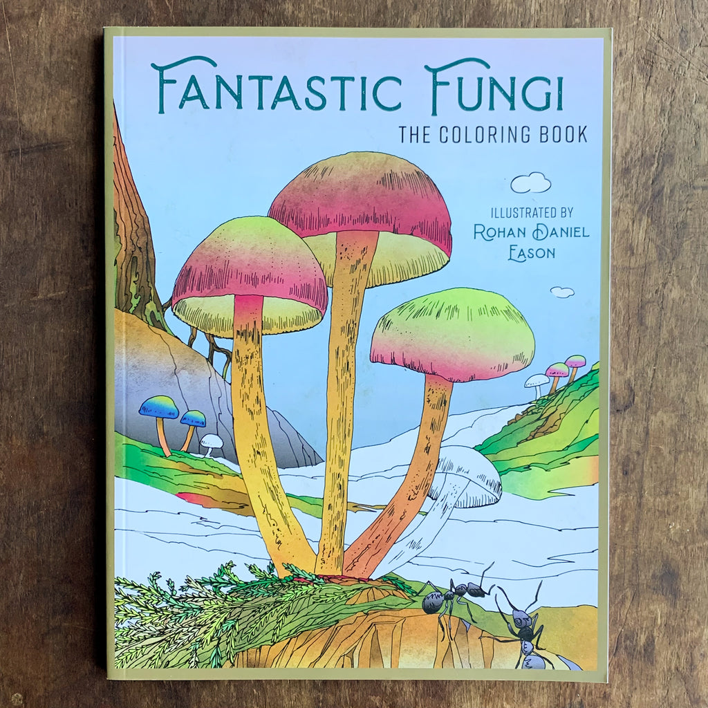 Partially colored softcover coloring book cover featuring a red and yellow cluster of mushrooms