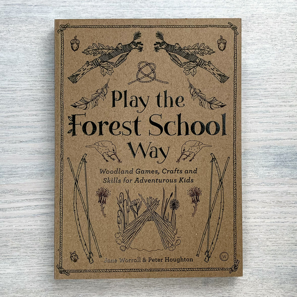 Soft front cover of Play The Forest School Way, featuring black and white line drawings of a lean-to made of tree branches, a bow and arrow, and ropework on a rough brown background.