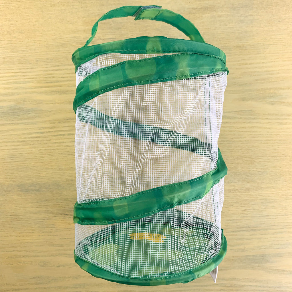 Pop up port a bug white mesh bag with green trim and handle.