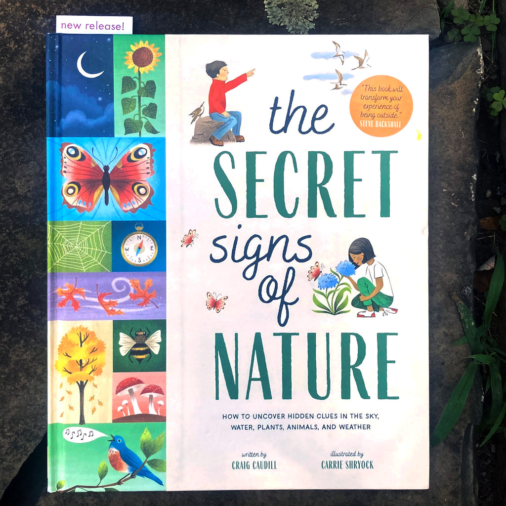 The Secret Signs of Nature hard front cover featuring illustrations of children observing birds and flowers along with illustrations of butterflies, trees, mushrooms, and and other nature imagery.