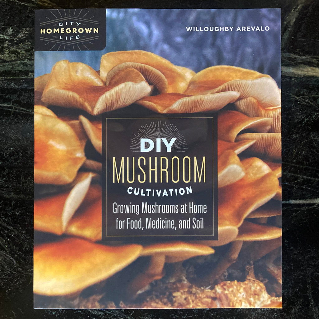 DIY Mushroom Cultivation soft front cover featuring a flush of golden mushrooms and the subtitle "Growing Mushrooms At Home For Food, Medicine, and Soil."