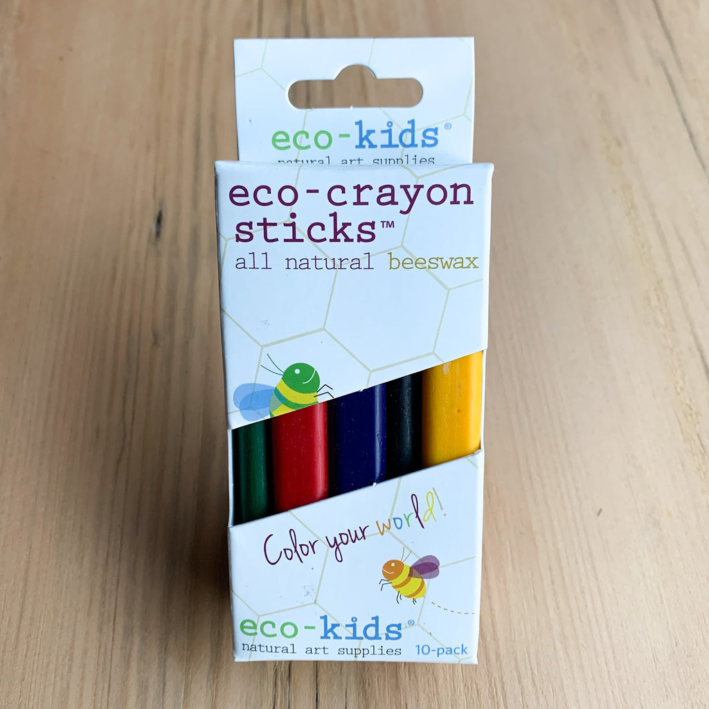 Small white box of crayons with diagonal cut-out revealing colorful crayons