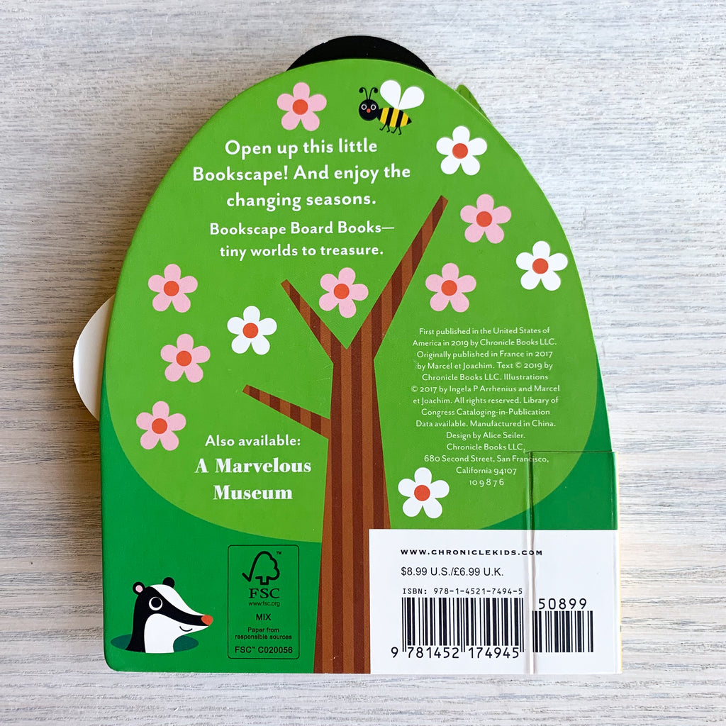 Back cover of die-cut board book with a tree in flower