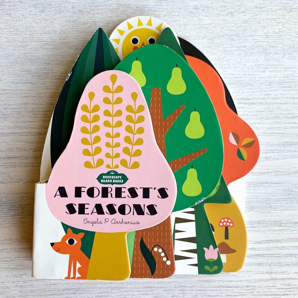Front cover of board book with colorful, die-cut pages of different shapes