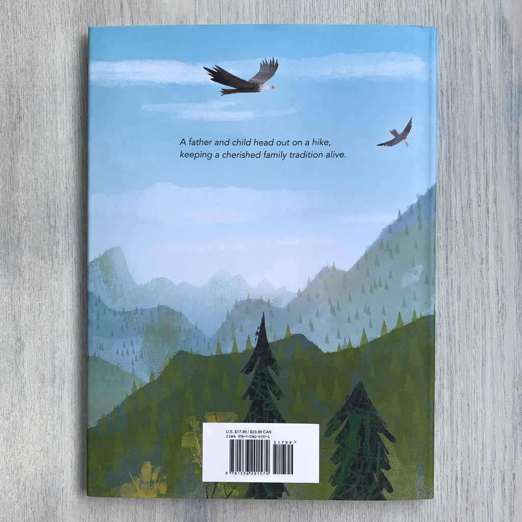 Back book jacket showing mountains and eagles