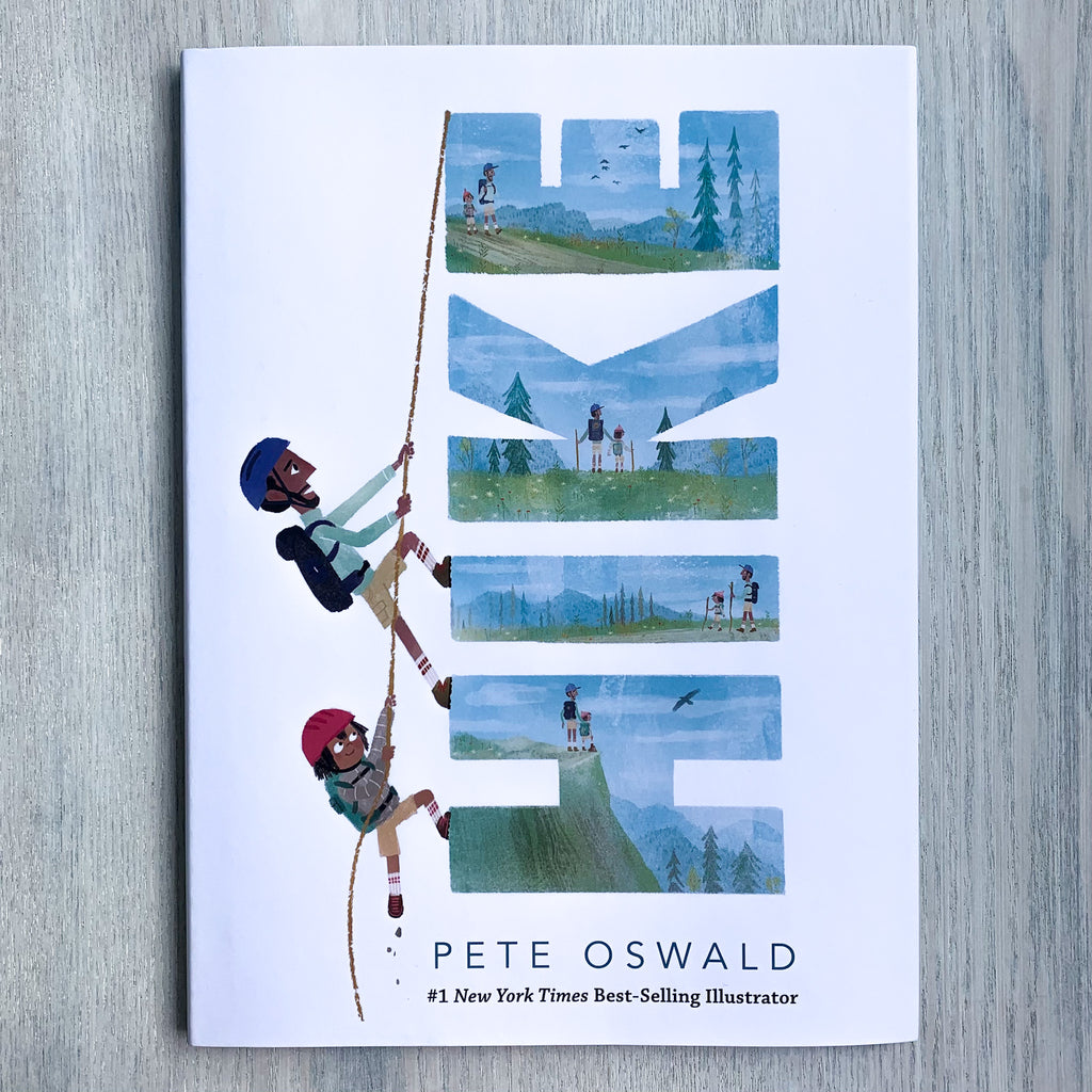 White hardcover book jacket with letters spelling "HIKE" running sideways showing nature scenes and a kid and father climbing up the side of the letters on a rope