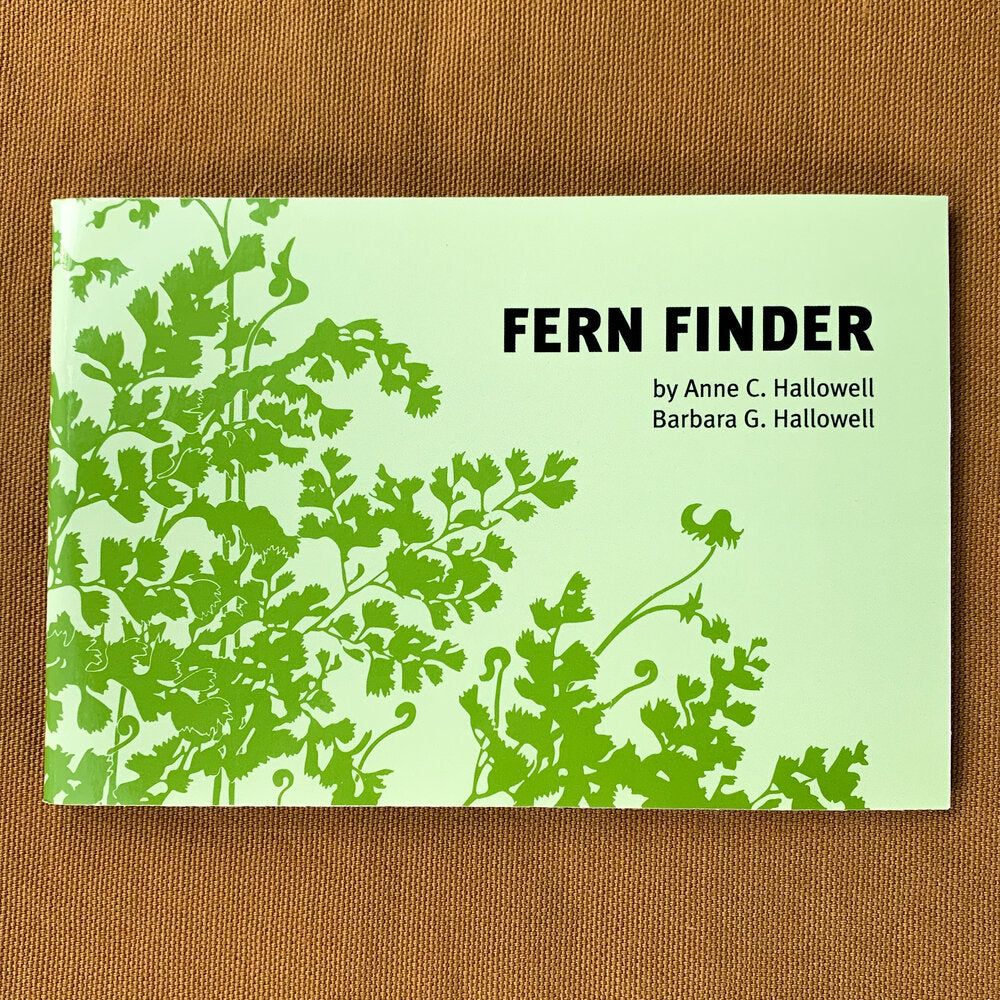 Pocket-sized softcover guide with light green background and darker green fern silhouette
