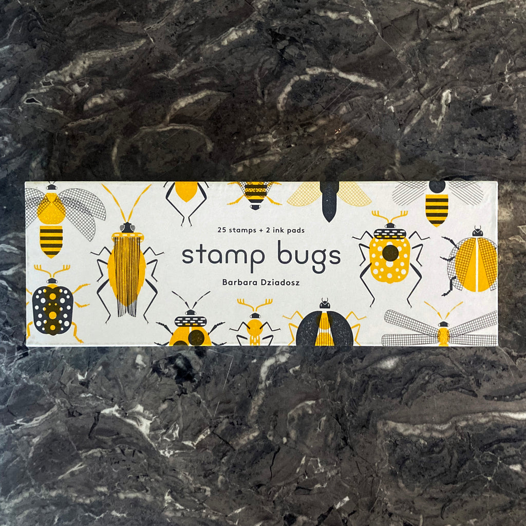Stamp Bugs box front cover featuring yellow and black examples of bugs that can be created with the stamp kit.